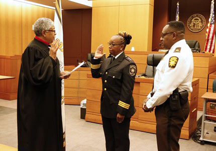 Maria McKee being swearing in as Marshal of Fulton County